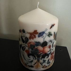 Beautiful candle never used, floral and bird details and vibrant colors